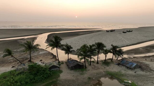 A wonderful view of the sunset in the sea. Cox's Bazar is the longest beach in Bangladesh.