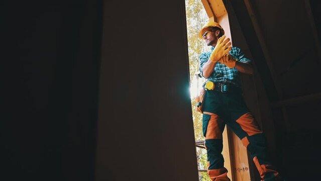 Building Contractor Wearing Protective Gloves