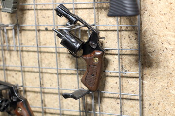 revolver on a stand at the shooting range before training