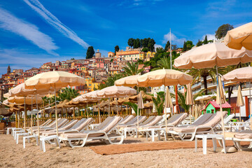 Colorful old town and beach in sunny Menton, French Riviera, France