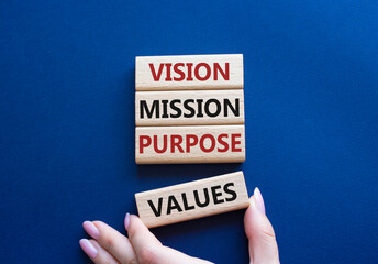 Vision Purpose Mission Values symbol. Concept word Vision Purpose Mission Values on wooden blocks....