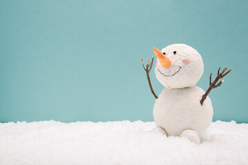 funny snowman on a turquoise background