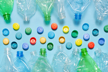 Crushed plastic bottle recycling plastic cap separate bottle lids. Separate waste sorting and...