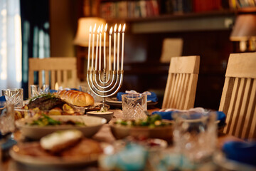 Hanukkah dining table prepared for family meal.