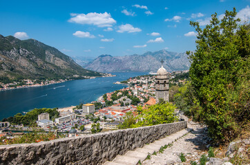 Fototapeta na wymiar Panoramic view of Kotor bay and city from the steps of the fortress walls, Montenegro.