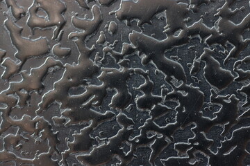 Fragment of a gray metal wall.