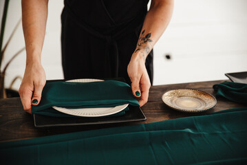 Setting the table in forest green