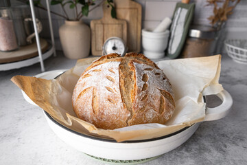 Healthy, homemade sourdough loaf, which of nutrition and whole grain. Traditional artisan pastry cook from home.