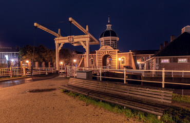 The old city gate Morspoort in Leiden at sunrise.