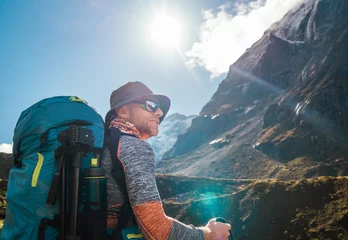 Keuken foto achterwand Makalu Portrait Young hiker backpacker man enjoying valley view in Makalu Barun Park route near Khare during high altitude acclimatization walk. Mera peak trekking route, Nepal. Active vacation concept image