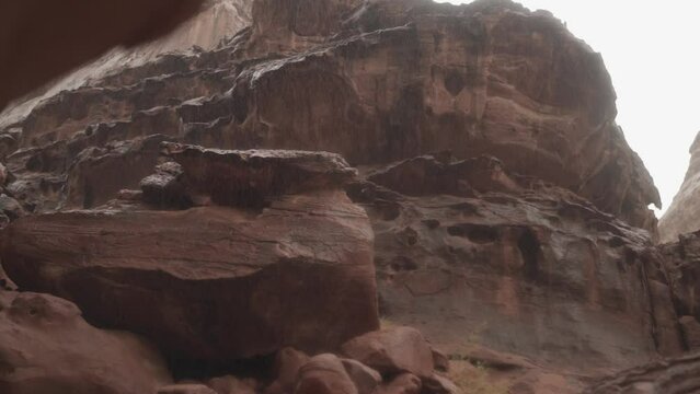 Cinematic Footage of Rain Shower and Atmospheric Storm Clouds Over Sandstone Desert Mountains in NEOM Saudi Arabia