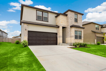 a home garage with a driveway 