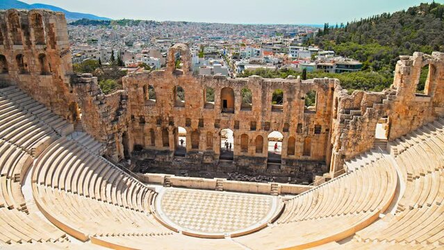 A stone Roman theatre structure of Odeon of Herodes Atticus in Athens. Historical and architectural building in Acropolis of Athens, Greece.