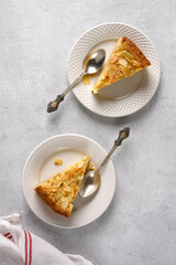 two plates with pieces of apple pie, top view