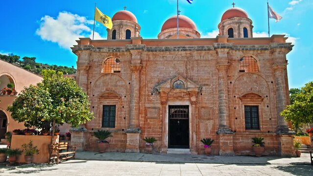 View of a monastery housing a museum of rare religious works in Crete. Byzantine architectural cruciform style with three domes Holy Trinity (Agia Triada) Tzagaroli Monastery in Greece.