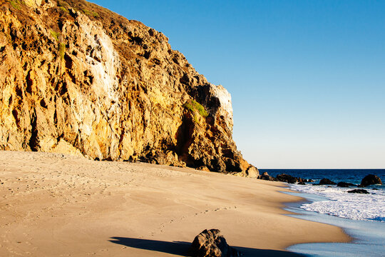 Dume Cove Malibu, Zuma Beach, emerald and blue water in a quite paradise beach surrounded by cliffs