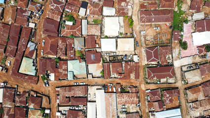 Bird eye view of old crowded city with rusted roofs