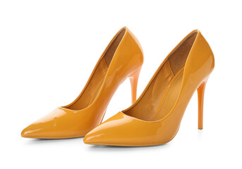 Stylish yellow high heels on white background
