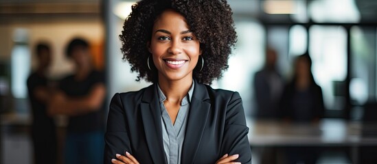 Positive black woman in office showing leadership management development vision inspiration mission growth motivation and empowerment
