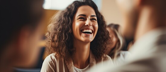 Psychologist leading group therapy with happy participants