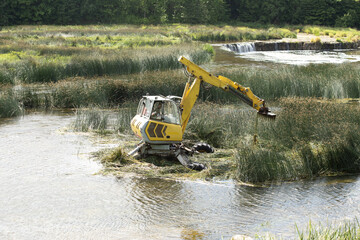 Cleaning the Ventas river from algae, Kuldiga, Latvija