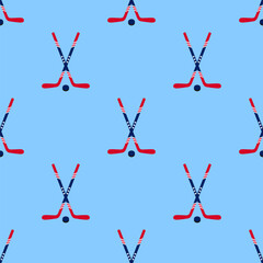 Hockey vector background. American ice hockey sticks and puck seamless pattern in a USA flag traditional colors and stars symbols. Winter sports repeated texture for sporting designs, prints