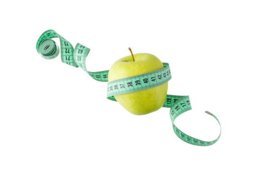 Green apple and measuring tape flying isolated on white background. Symbol of healthy dieting and control weight.