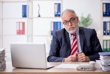 Old male employee and too much work in the office