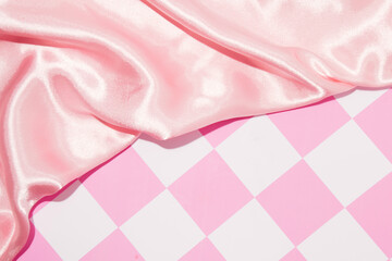 Combination of retro pattern and silk drapery, nostalgia of the fifties, pastel pink layout.