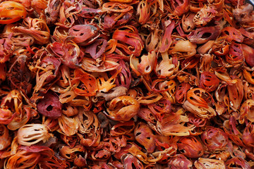 nut mace, Mace is the spice made from the reddish seed covering (aril) of the nutmeg seed. plant known as myristica fragrans