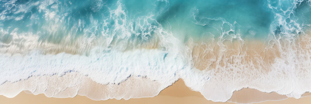 Drone perspective overlooking the clean and beautiful beach and waves