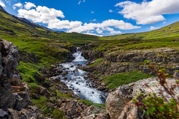 Fototapeta na wymiar Waterfall near Seidisfjordur in Island