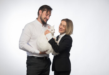 couple with white cat on white background