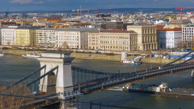Secheni chain bridge on danube. A view of secheni chain bridge over river against sunny Budapest city.