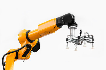Industrial robotic arm with vacuum grip for moving heavy boxes. Factory robot isolated on white...