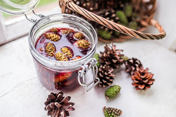 jar of pine cone jam, a gift from nature that can be enjoyed on its own or used to make a delicious and nutritious tea to soothe a sore throat.