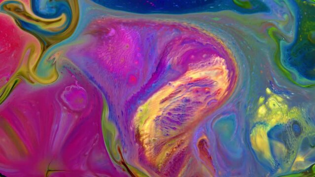 Mixture of colorful paints. It can be a great background for your computer screens. And if you need a compositing element for your motion graphics and other visual elements, choose this clip.