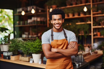Handsome young black male organic food store owner standing behind counter and smiling, successful...