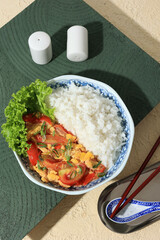 Scrambled Egg with Tomato Stir Fry, Served with Rice.