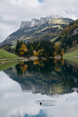 Fototapeta na wymiar Lake Seealpsee near Appenzell in swiss Alps, Ebenalp, Switzerland. Swiss mountain view