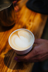 pouring coffee into a cup