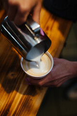 pouring coffee into a cup