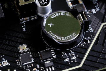 A made-in-China lithium battery installed in a modern computer's motherboard to power CMOS memory....