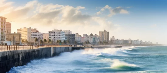 Fototapeten Waves crash against the Malecon seawall in Havana © 2ragon