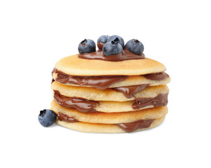 Stack of tasty pancakes with chocolate spread and blueberries isolated on white
