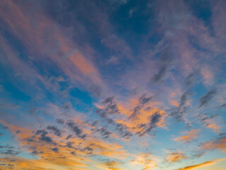 Aerial sunrise seascape with pretty cloud filled sky