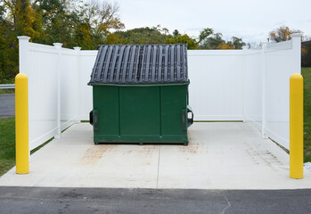 large green commercial dumpster for trash and recycling - obrazy, fototapety, plakaty