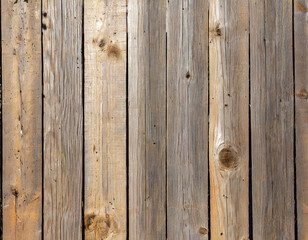 Fototapeta premium Full frame texture background of a wooden fence with natural wood grain planks, in bright sunlight