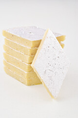 Closeup of kaju katli sweet isolated on white background