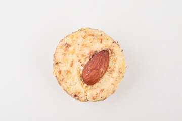 Top view of almond cookie isolated on white background